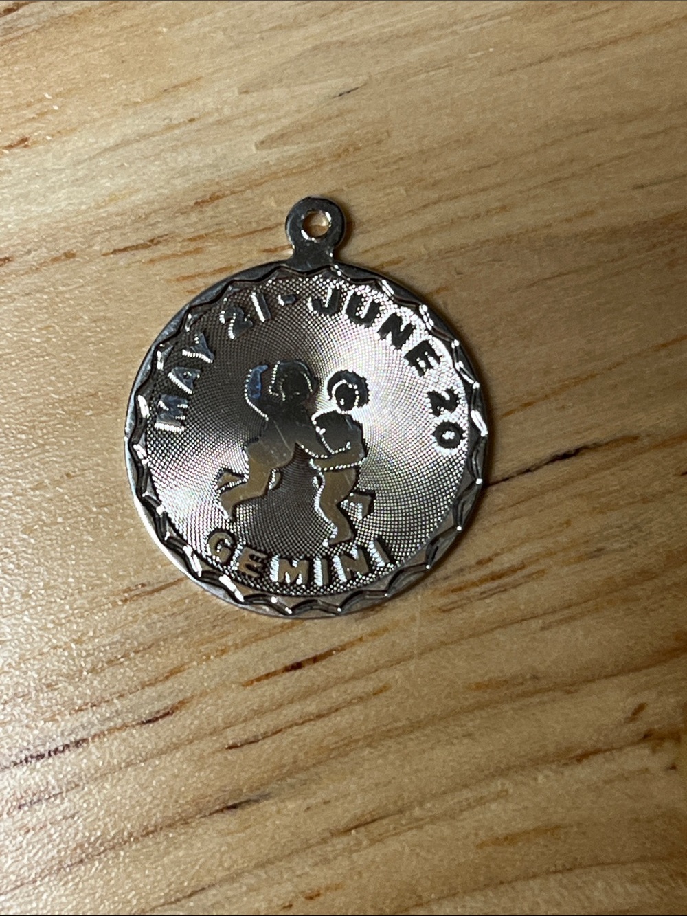 Gemini Astrology Round Silver toned pendant marked Sterling